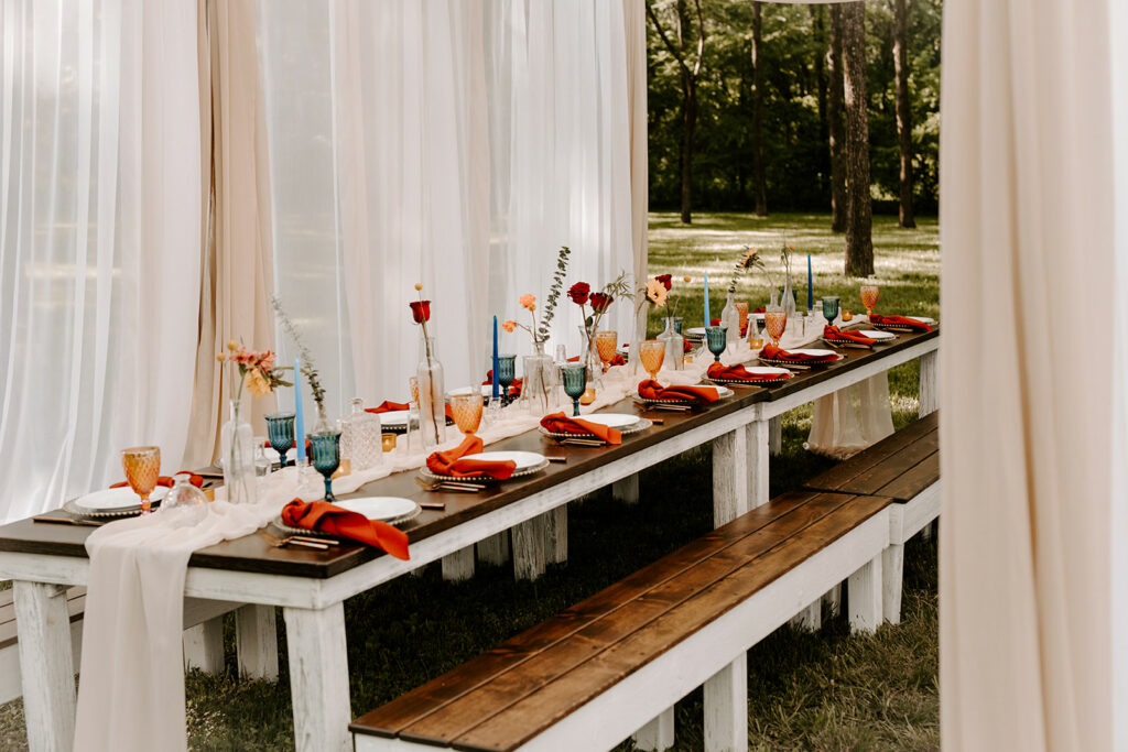 tasks to delegate - wedding table decorated with flowers and candles